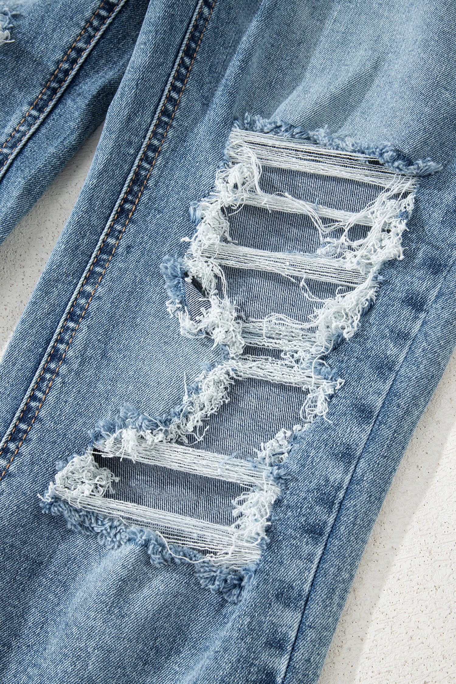Ripped Open Knee Fit Flare Jeans